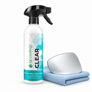 IGL Clear glass cleaner beside a glass cloth and mirror sample